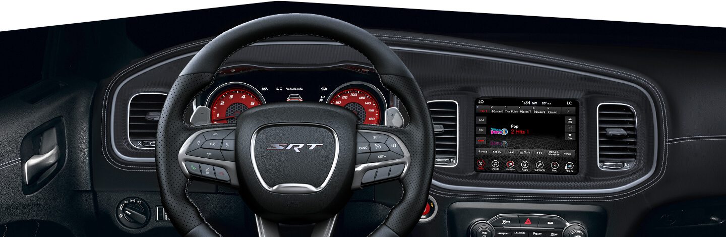 An interior view of the steering wheel and dashboard in the 2020 Dodge Charger.